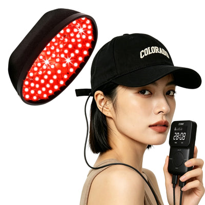 LLLT Laser Hair Growth Cap – Model Wearing Black Cap with Wireless Controller for At-Home Hair Regrowth | KMSLASER